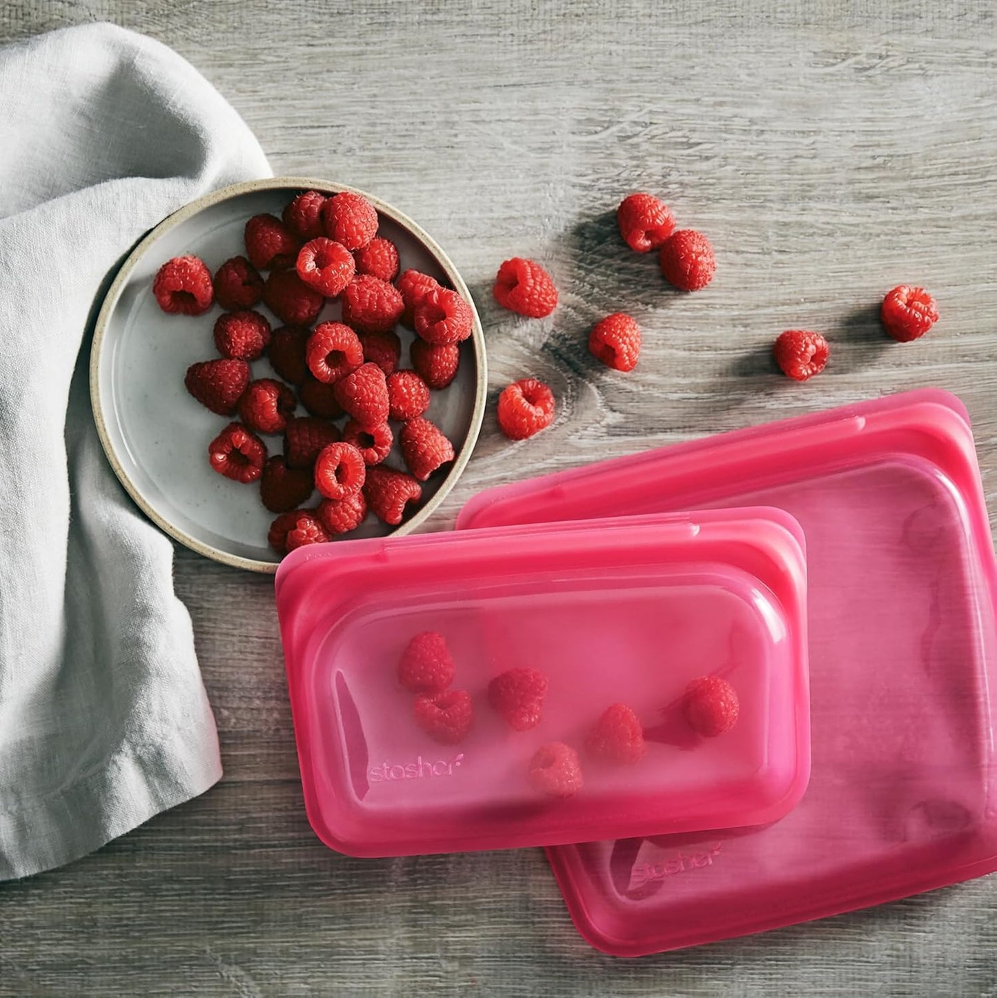Stasher Premium Silicone Reusable Food Storage Snack Bag, Raspberry, Microwave, Sous Vide, Dishwasher, Oven and Freezer Safe, BPA Free, Leak-free, Eco-friendly, 12 Oz